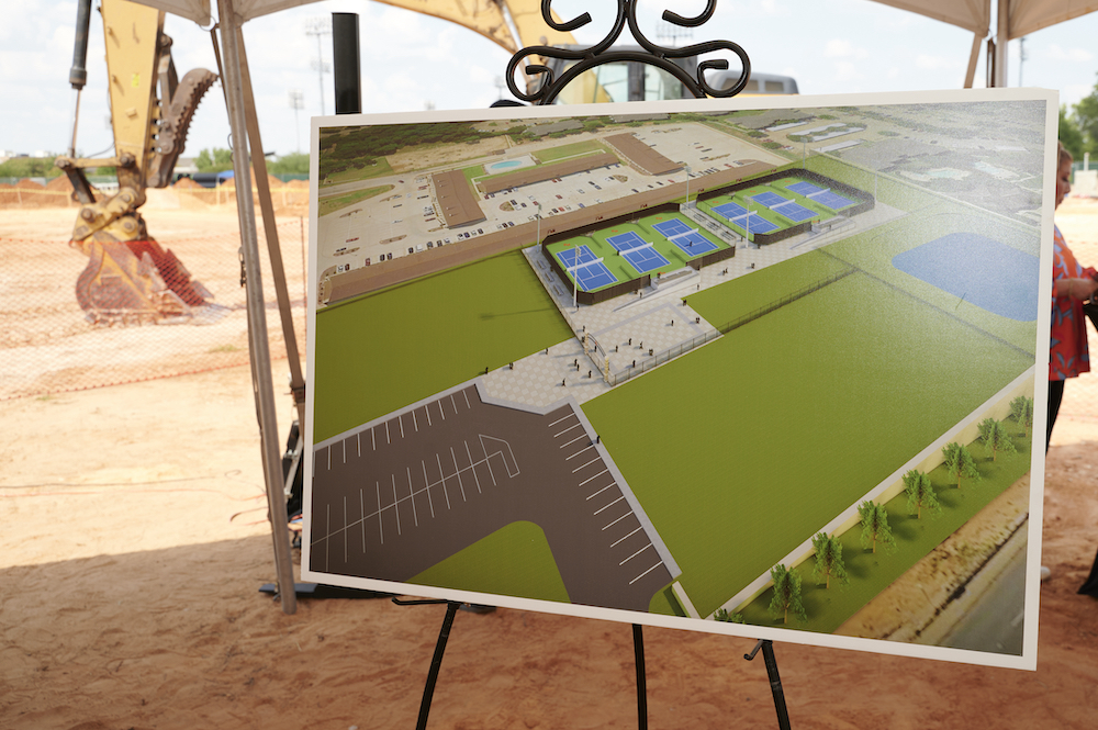An artist's rendering of the upcoming tennis center was shown during the event at the construction site.
